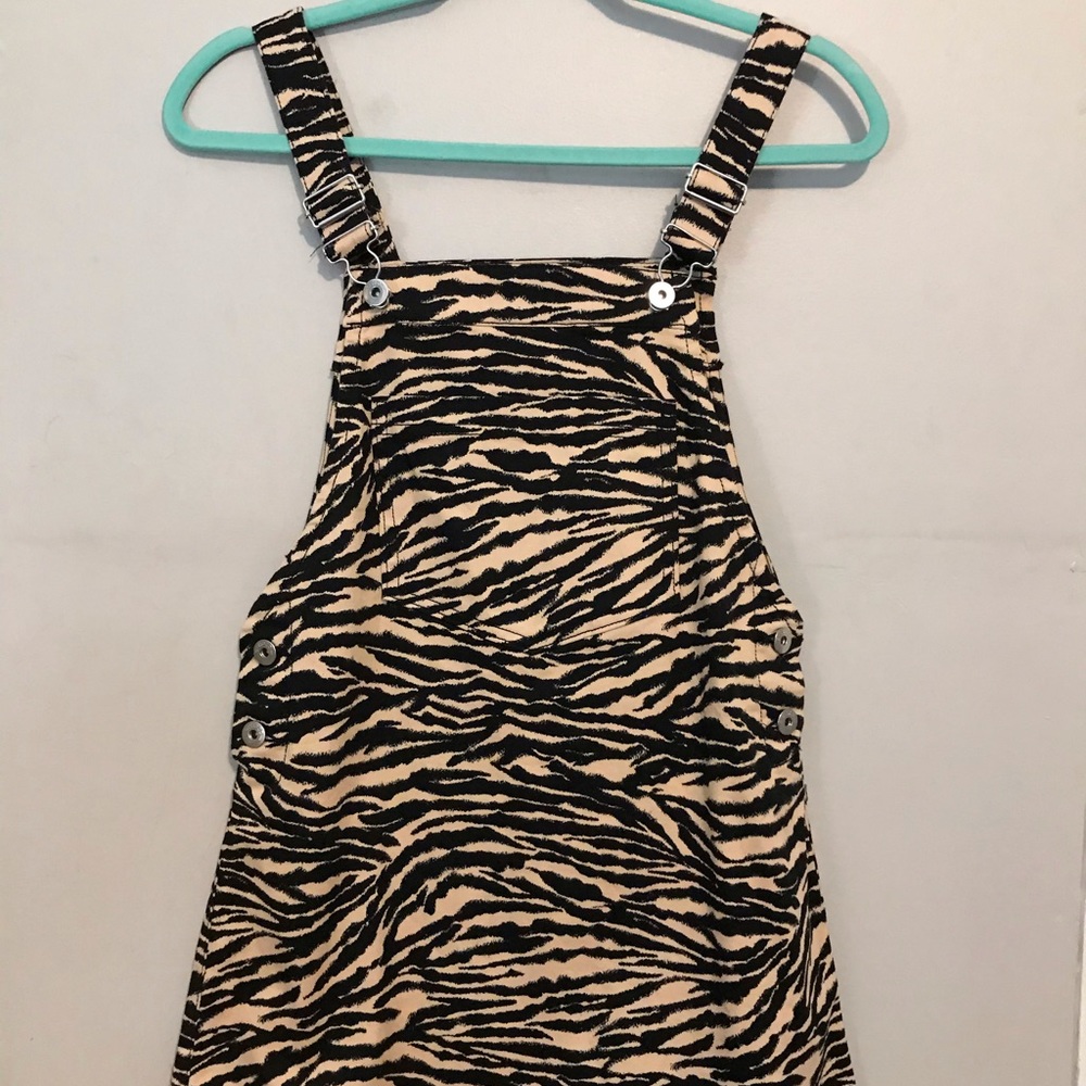 Zebra print overall dress.